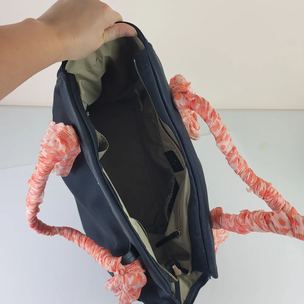 Kate Spade black diaper back, Peachy coral wrapped handles